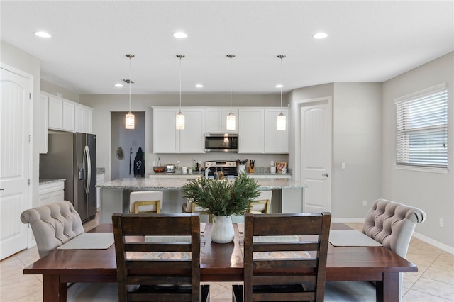 dining room featuring light tile patterned floors