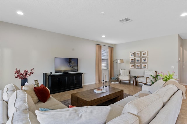 living room featuring light tile patterned floors