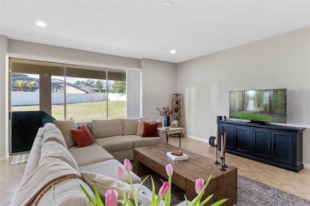 tiled living room with a textured ceiling