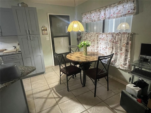 view of tiled dining space