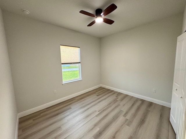 150 Marion Oaks Trl, Ocala, FL 34473 - empty room featuring light wood-style flooring, ceiling fan, and baseboards