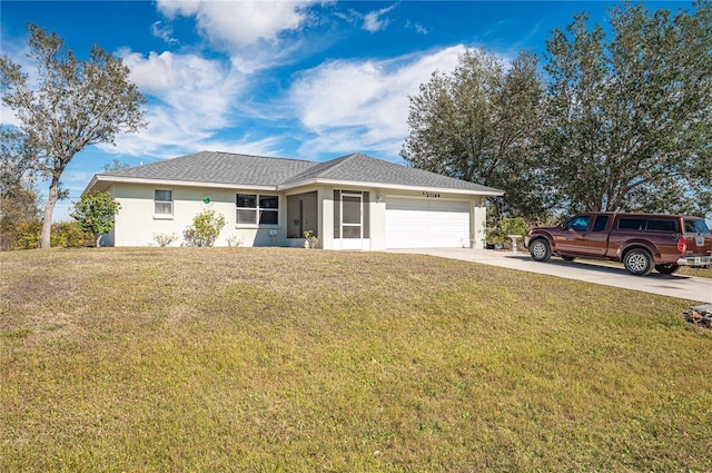 ranch-style home with a garage and a front lawn