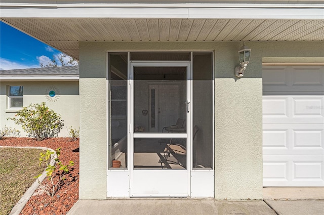 entrance to property with a garage