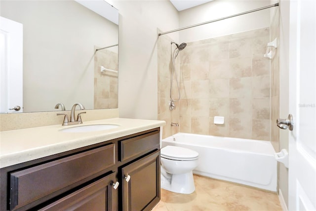 full bathroom with tiled shower / bath combo, vanity, tile patterned floors, and toilet