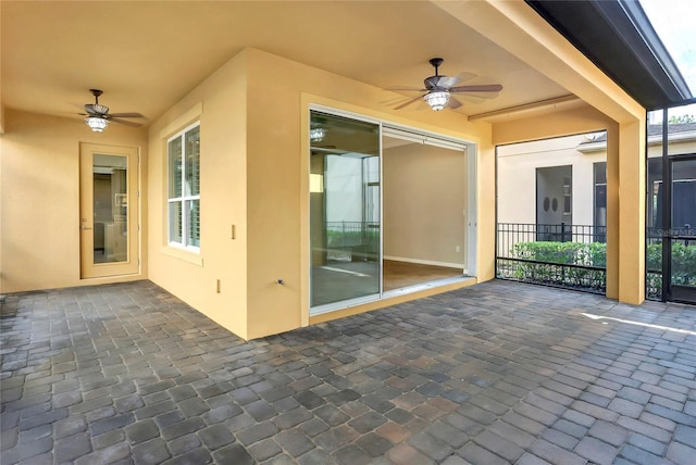 view of patio / terrace featuring ceiling fan