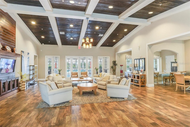 living room featuring wood ceiling, wood-type flooring, high vaulted ceiling, and french doors