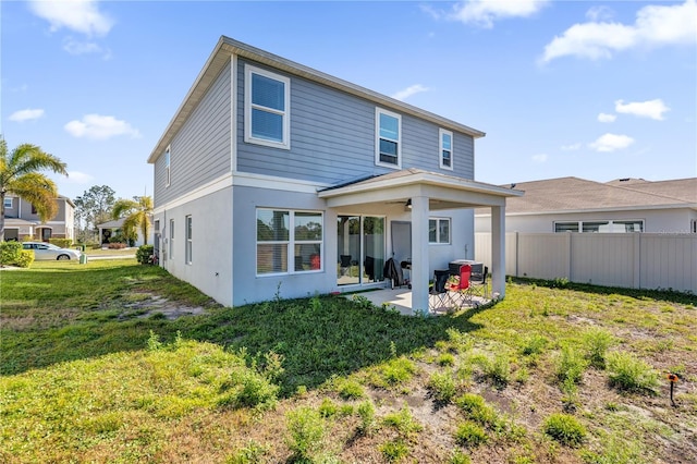 361 Preserve Pointe Blvd, Davenport, FL 33837 - rear view of property featuring a patio, a ceiling fan, and stucco siding