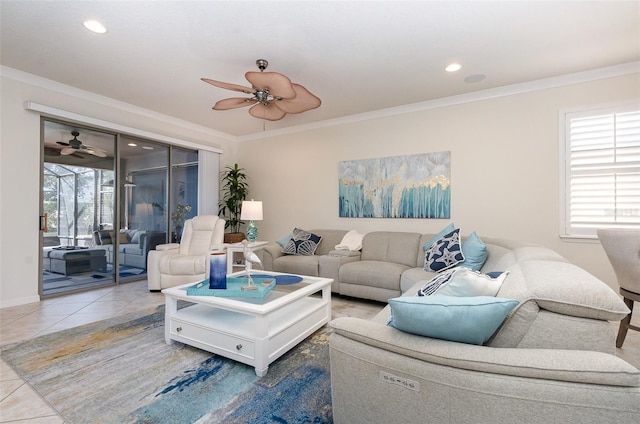 tiled living room with ornamental molding and ceiling fan