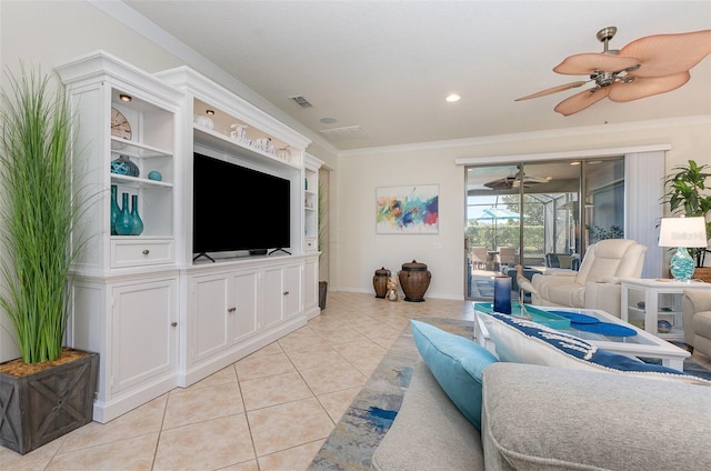 tiled living room featuring crown molding, built in shelves, and ceiling fan