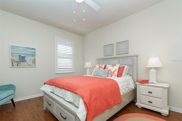 bedroom with dark hardwood / wood-style floors and ceiling fan