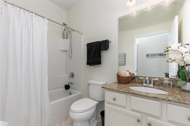 full bathroom with vanity, shower / tub combo, and toilet