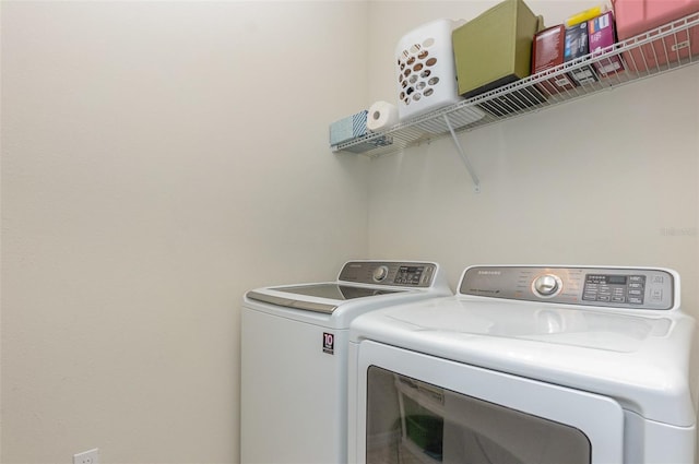 laundry room featuring washer and dryer