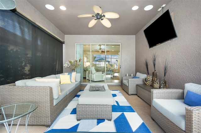 living room featuring ceiling fan