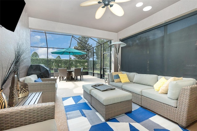 sunroom / solarium with ceiling fan