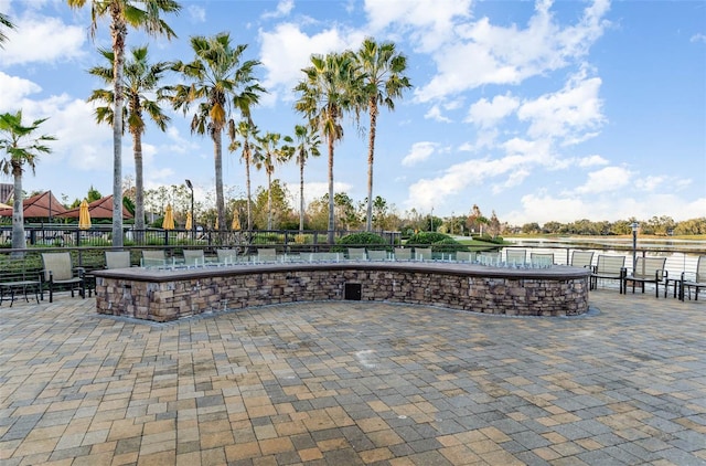 view of patio / terrace featuring a water view