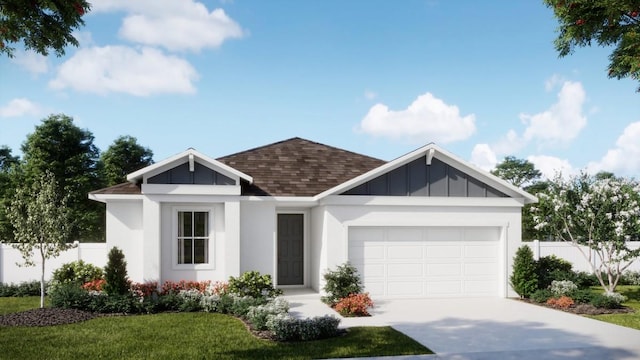 view of front of house with a garage and a front lawn