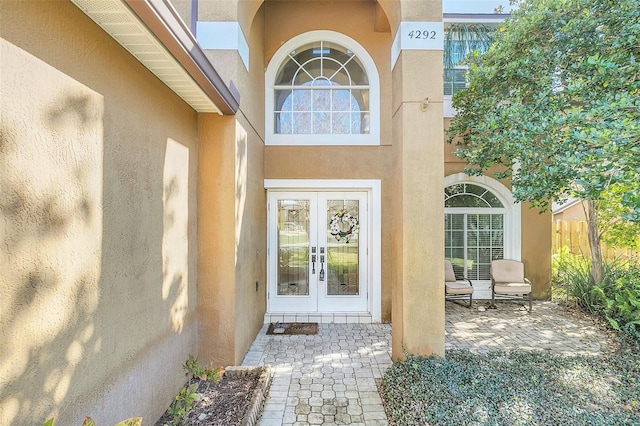 doorway to property featuring french doors