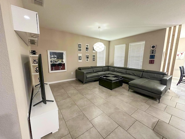 living room featuring light tile patterned flooring