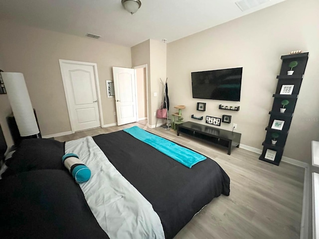 bedroom featuring light hardwood / wood-style flooring