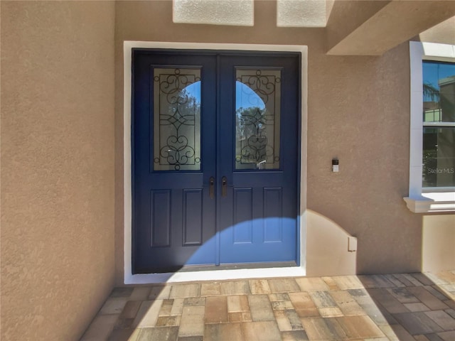 view of exterior entry with french doors