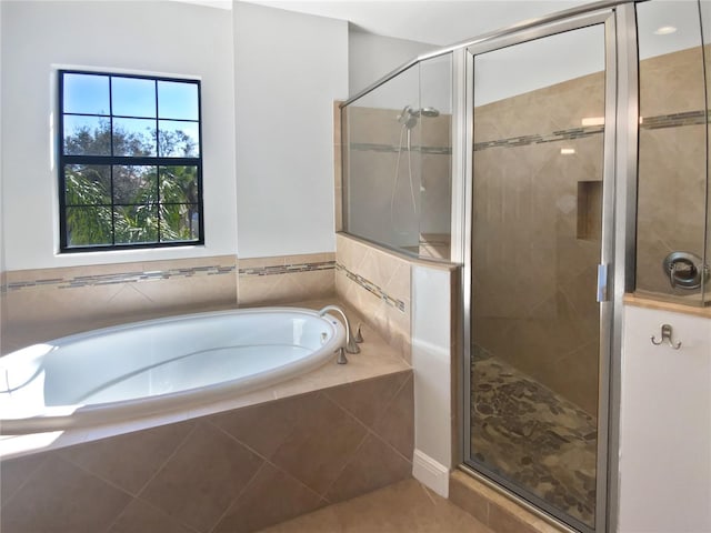 bathroom with independent shower and bath