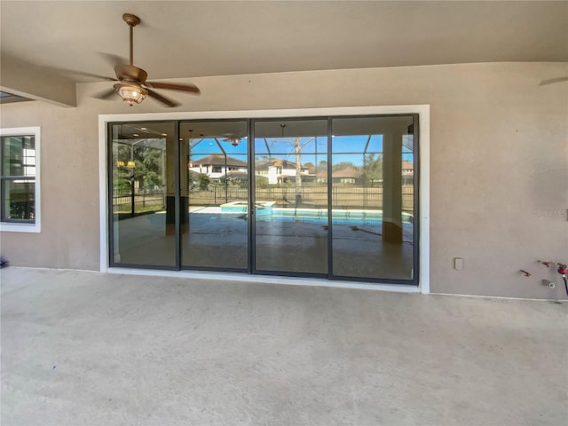 view of patio with ceiling fan