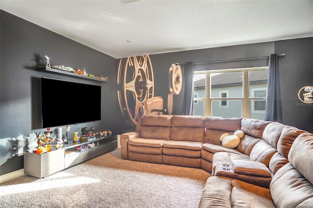 carpeted living room with a textured ceiling