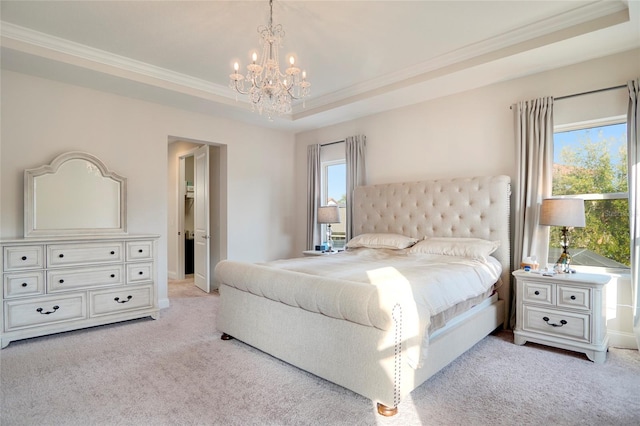 bedroom featuring a notable chandelier, ornamental molding, light colored carpet, and a raised ceiling