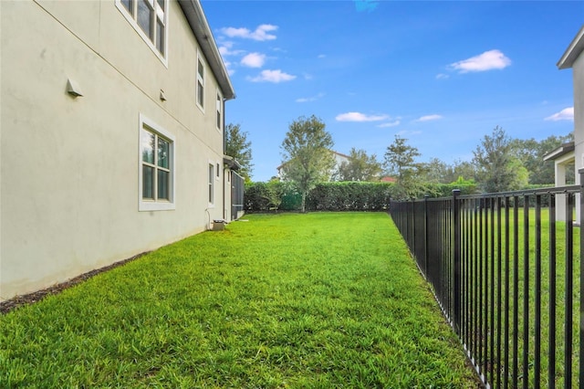 view of yard with a fenced backyard