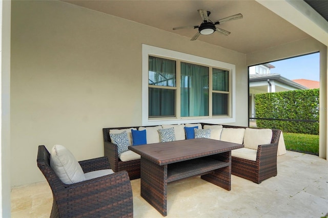 view of patio featuring ceiling fan and an outdoor living space