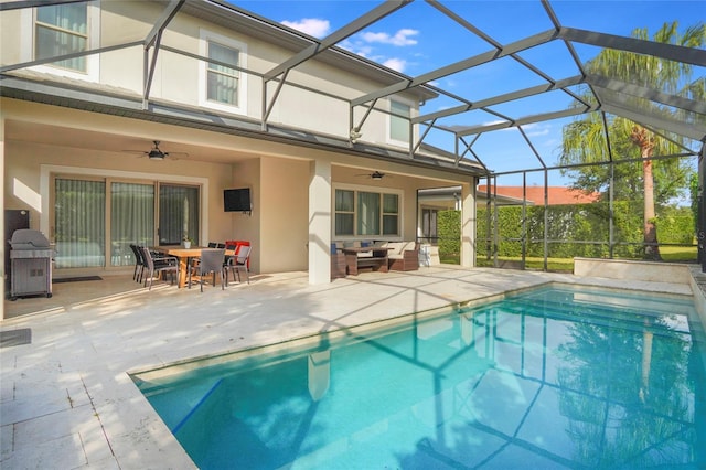 pool with a ceiling fan, glass enclosure, a patio area, an outdoor living space, and outdoor dining space