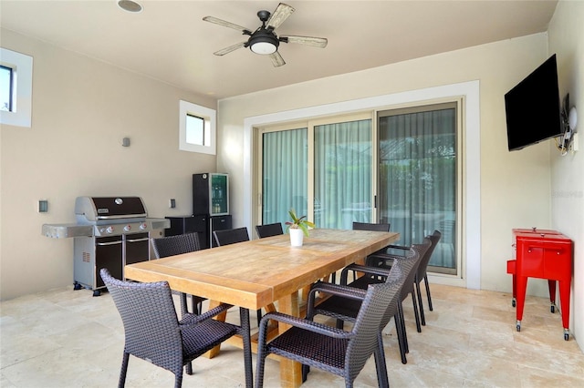 dining area with ceiling fan