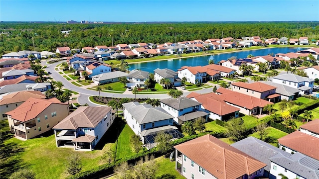 aerial view featuring a residential view and a water view