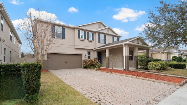 view of front of property with a garage