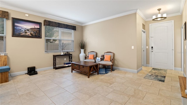 tiled entrance foyer featuring an inviting chandelier and crown molding