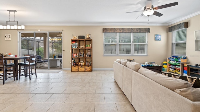 living room with light tile patterned flooring, ceiling fan, and ornamental molding