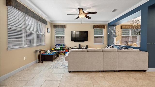 living room featuring ceiling fan, ornamental molding, and tile patterned flooring