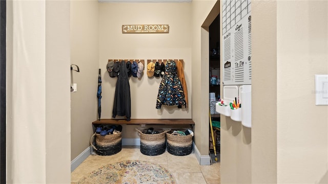 mudroom featuring light tile patterned flooring