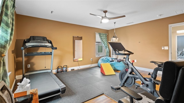 exercise room featuring ceiling fan