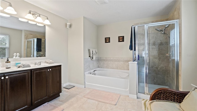 bathroom with vanity, separate shower and tub, and tile patterned floors