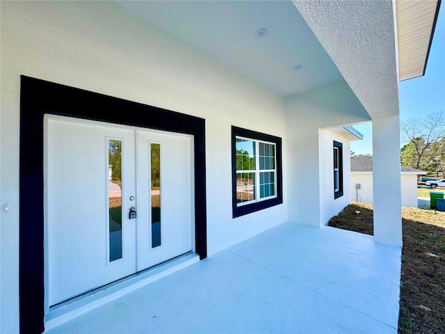 view of patio featuring french doors