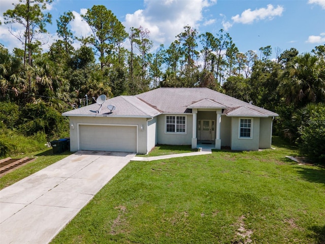 single story home featuring a garage and a front lawn