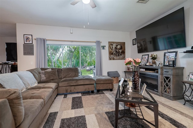 living room with ceiling fan