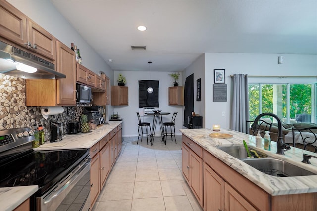 kitchen featuring decorative light fixtures, sink, stainless steel range with electric cooktop, backsplash, and light tile patterned floors