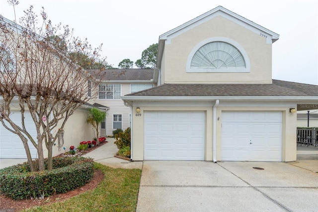 front of property with a garage