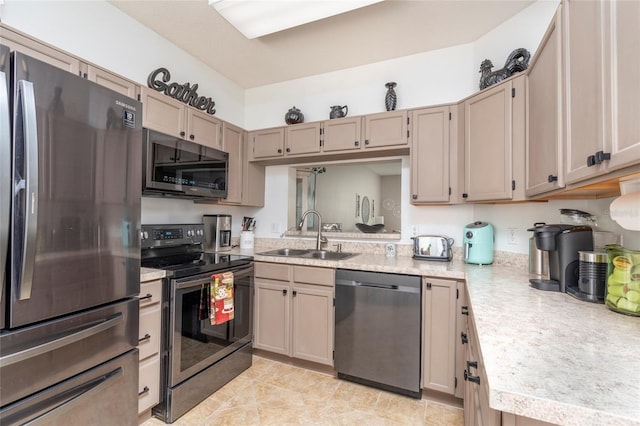 kitchen featuring appliances with stainless steel finishes and sink