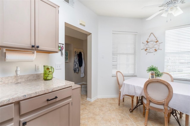 dining room featuring ceiling fan