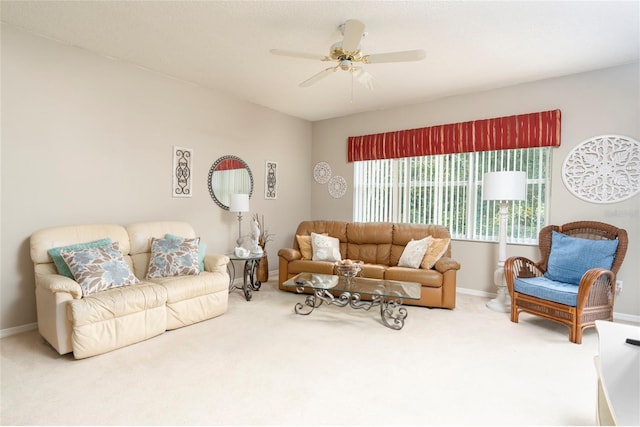 living room with carpet flooring and ceiling fan