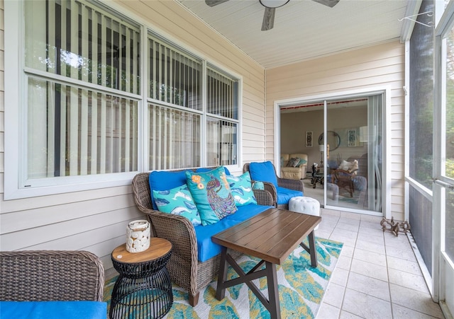 sunroom / solarium with ceiling fan