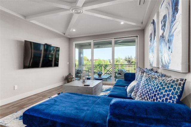 living room featuring hardwood / wood-style flooring and beamed ceiling